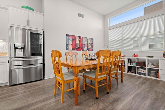 2013 Bravo Loop Unit 5, Chula Vista, CA 91915 - dining space featuring wood finished floors and baseboards