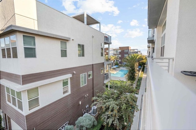 2013 Bravo Loop Unit 5, Chula Vista, CA 91915 - view of property exterior featuring stucco siding and a balcony
