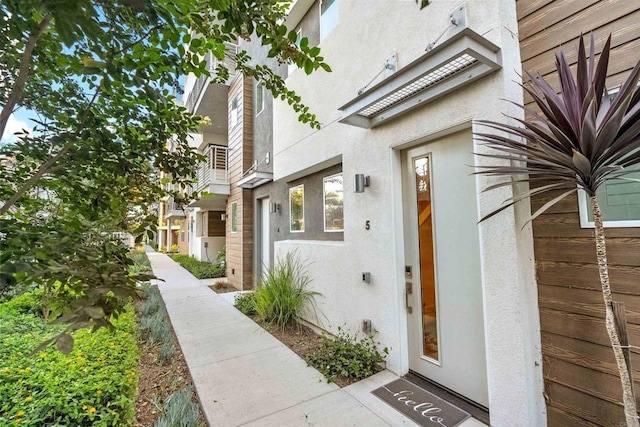 2013 Bravo Loop Unit 5, Chula Vista, CA 91915 - doorway to property with stucco siding