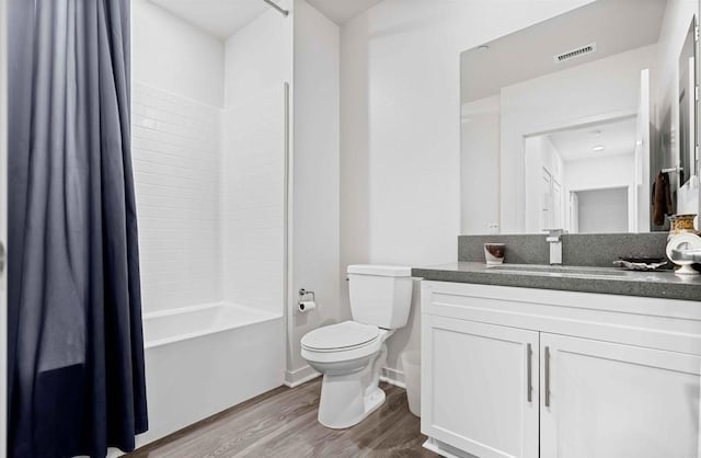 2013 Bravo Loop Unit 5, Chula Vista, CA 91915 - full bathroom featuring wood finished floors, vanity, and shower / bathtub combination with curtain