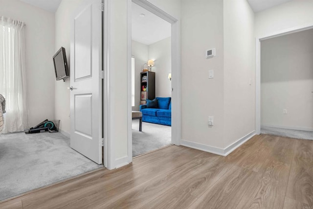 2013 Bravo Loop Unit 5, Chula Vista, CA 91915 - corridor with light wood finished floors and baseboards