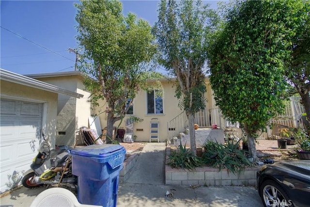 view of property exterior featuring a garage