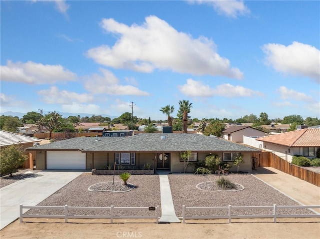 single story home featuring a garage