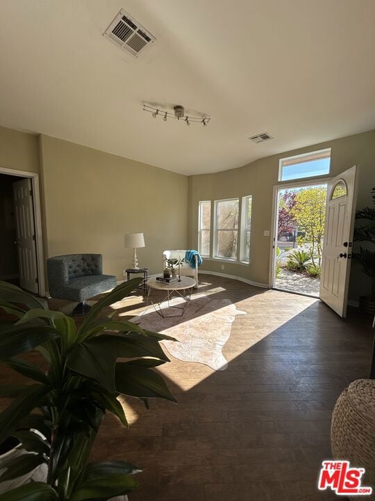 interior space with dark hardwood / wood-style floors