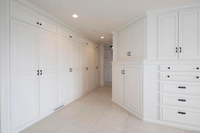 hallway with light tile patterned flooring