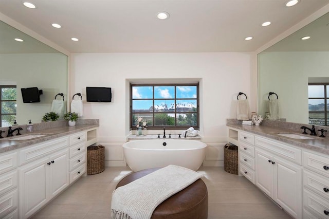 bathroom featuring a bathtub and vanity