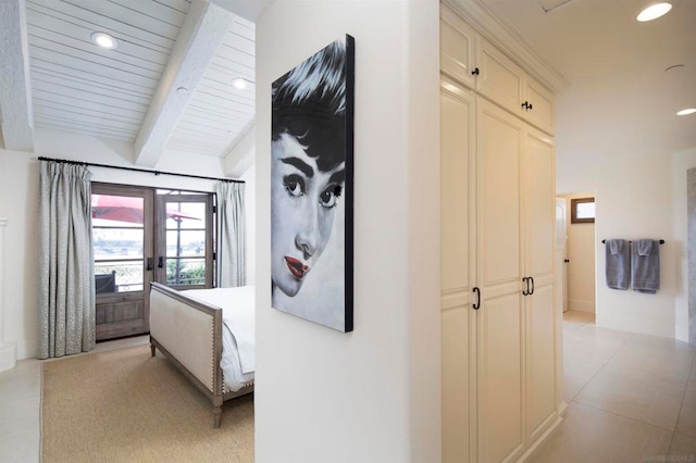 hallway featuring french doors, light tile patterned flooring, lofted ceiling with beams, and wooden ceiling