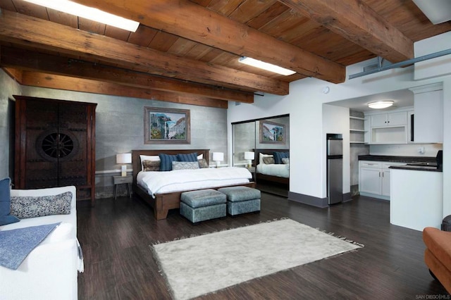 bedroom with beamed ceiling, stainless steel fridge, dark wood-type flooring, and wooden ceiling