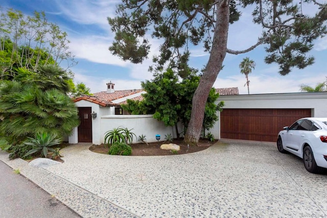 view of front of property with a garage