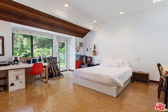 bedroom featuring built in desk