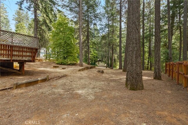 6032 Tiffin Ct, Magalia, CA 95954 - view of yard with fence and a wooden deck