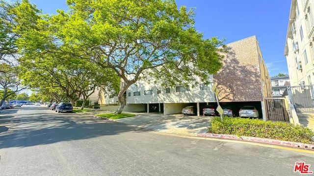 view of building exterior with a carport