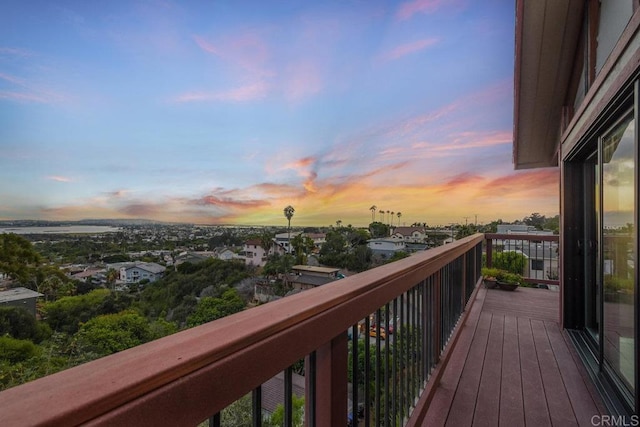 view of balcony at dusk