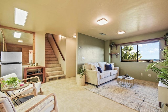 living room featuring carpet flooring