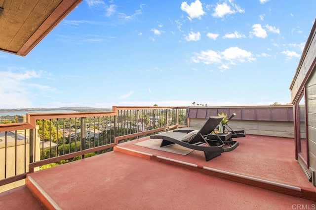 view of patio / terrace with a balcony