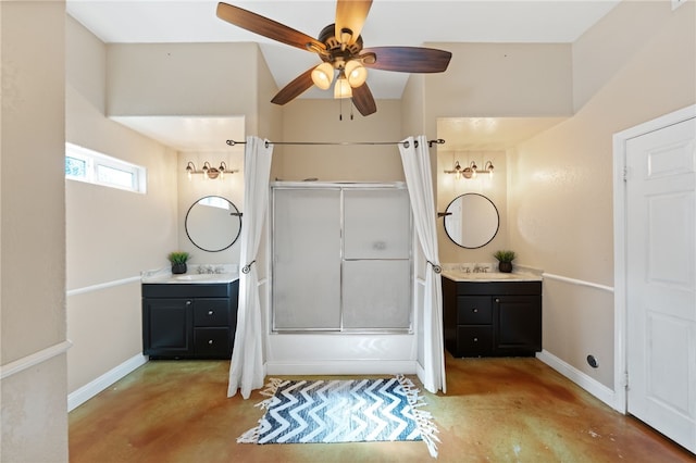 bathroom featuring bath / shower combo with glass door, ceiling fan, a sink, two vanities, and concrete flooring