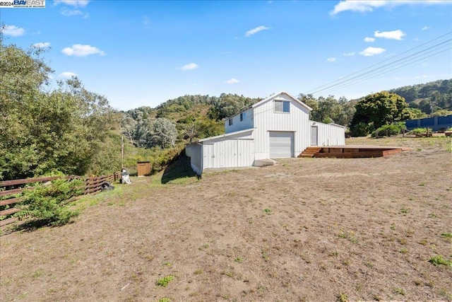 exterior space with an outbuilding