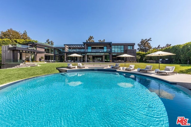 view of pool featuring a yard and a pergola