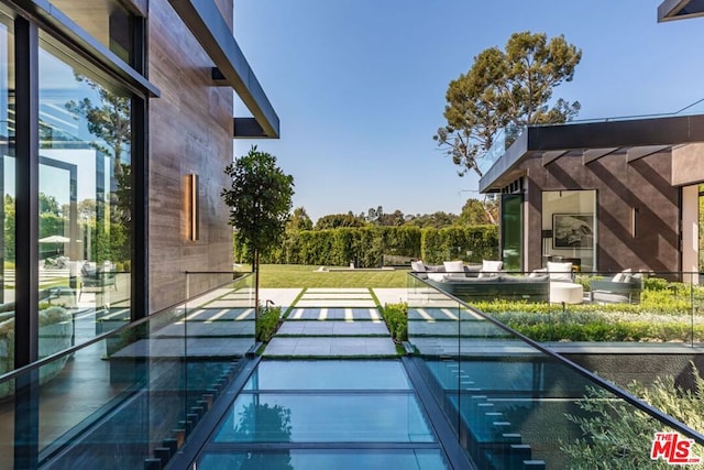 view of pool featuring a patio