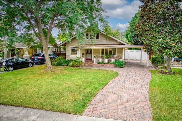 view of front of property with a front lawn and a porch