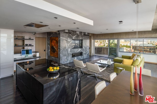 kitchen with dark hardwood / wood-style flooring