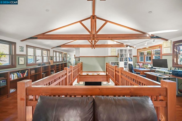 interior space featuring beam ceiling and hardwood / wood-style floors