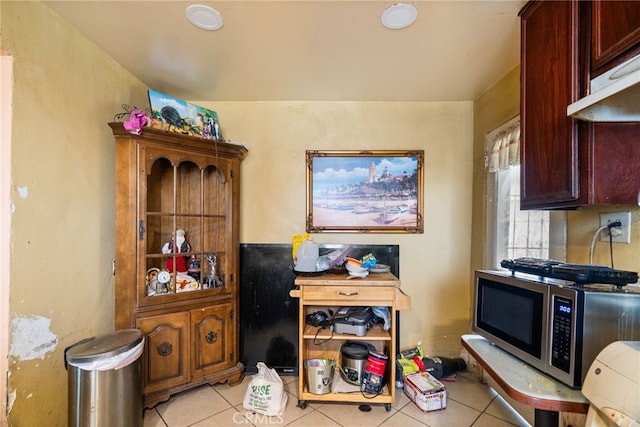 kitchen with light tile patterned floors