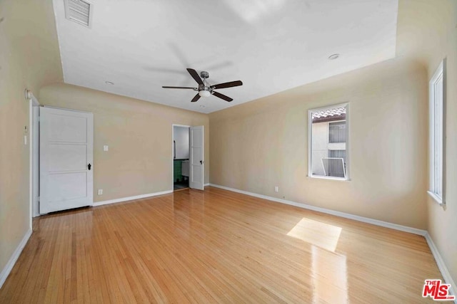 unfurnished room with ceiling fan and light hardwood / wood-style floors