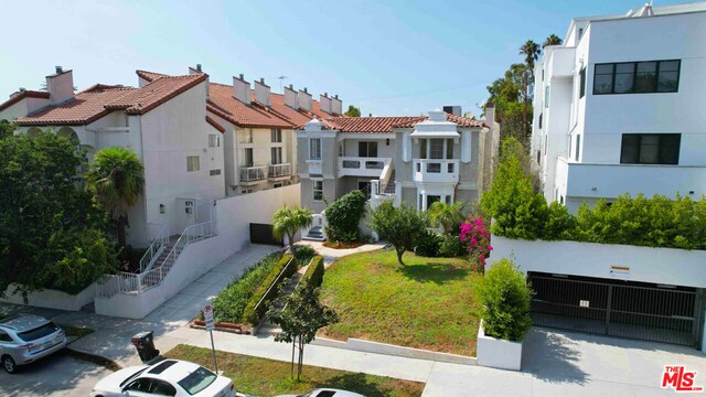 exterior space featuring a front lawn