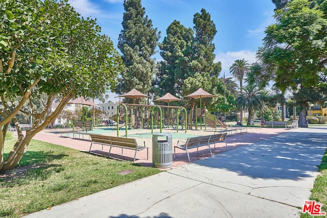 view of property's community with a playground