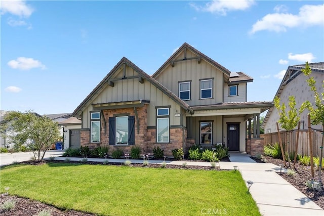 craftsman-style home with a front lawn