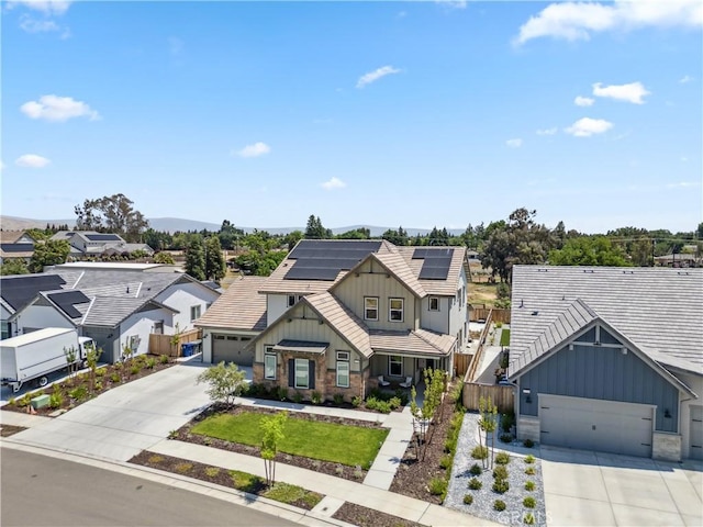 view of front of property with solar panels