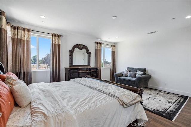 bedroom featuring wood-type flooring