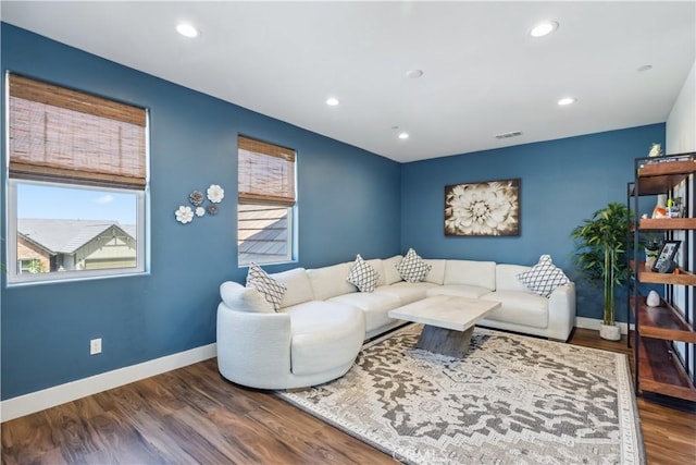 living room with dark hardwood / wood-style floors