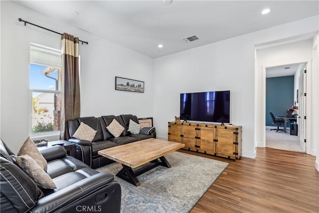 living room with hardwood / wood-style floors