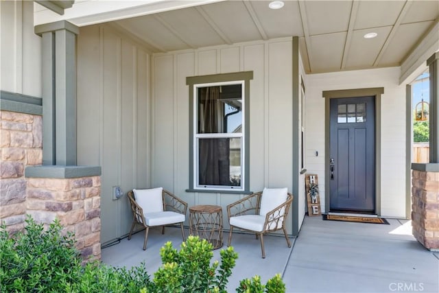 property entrance with covered porch