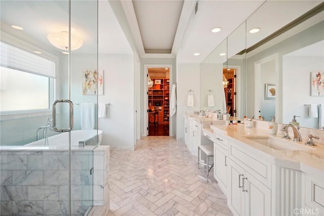 bathroom featuring vanity and a bathtub