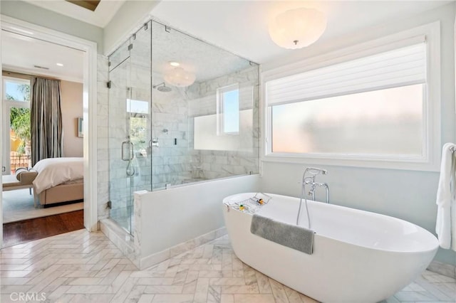 bathroom with separate shower and tub