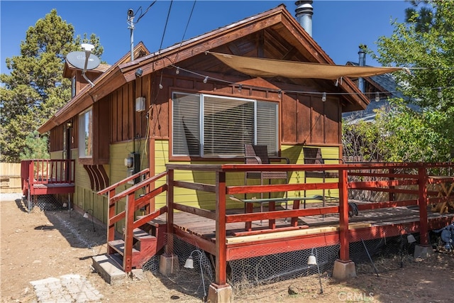 rear view of house with a deck