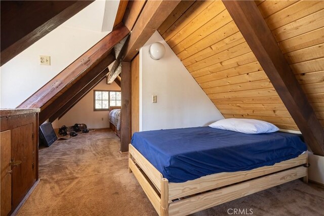 bedroom with carpet floors, wood ceiling, and lofted ceiling with beams