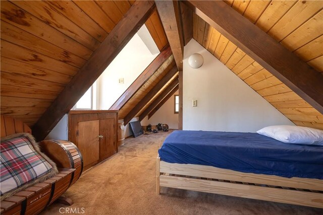 carpeted bedroom featuring wooden ceiling and lofted ceiling with beams