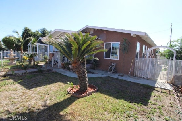 exterior space with a front lawn