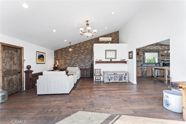 living room featuring dark hardwood / wood-style flooring, high vaulted ceiling, a wall unit AC, and an inviting chandelier