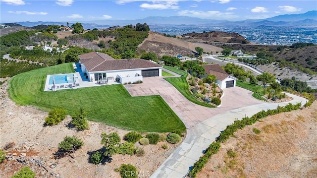 drone / aerial view featuring a mountain view