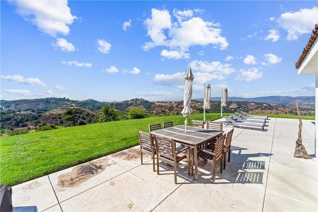 view of patio / terrace with a mountain view