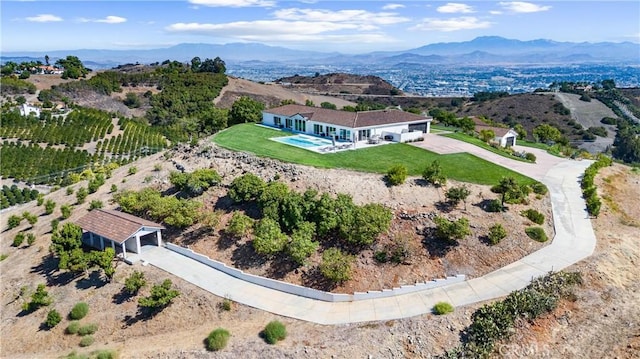 drone / aerial view with a mountain view