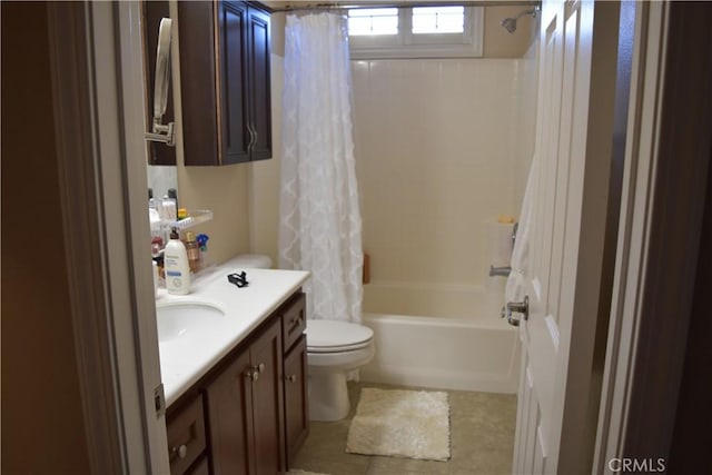 bathroom with shower / tub combo, vanity, and toilet