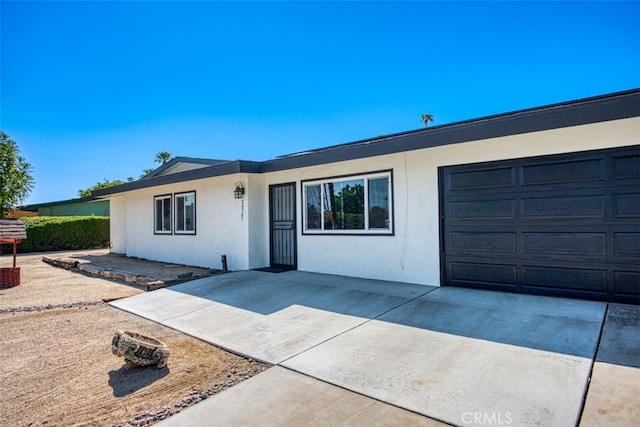 ranch-style house with a garage