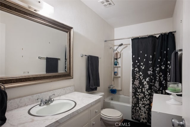 full bathroom featuring vanity, toilet, and shower / bath combo with shower curtain