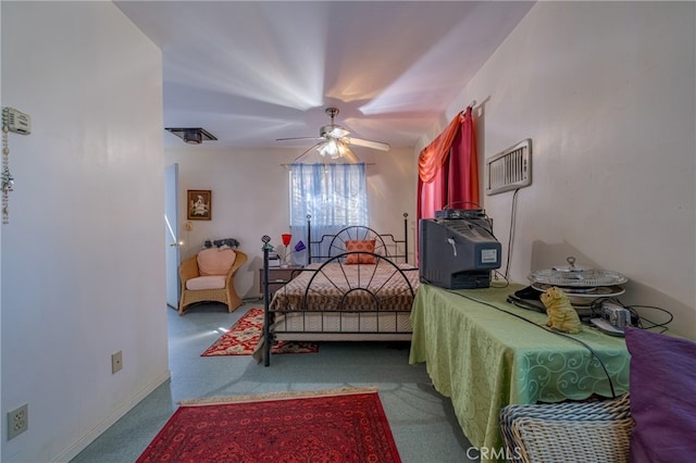 bedroom featuring ceiling fan and carpet floors